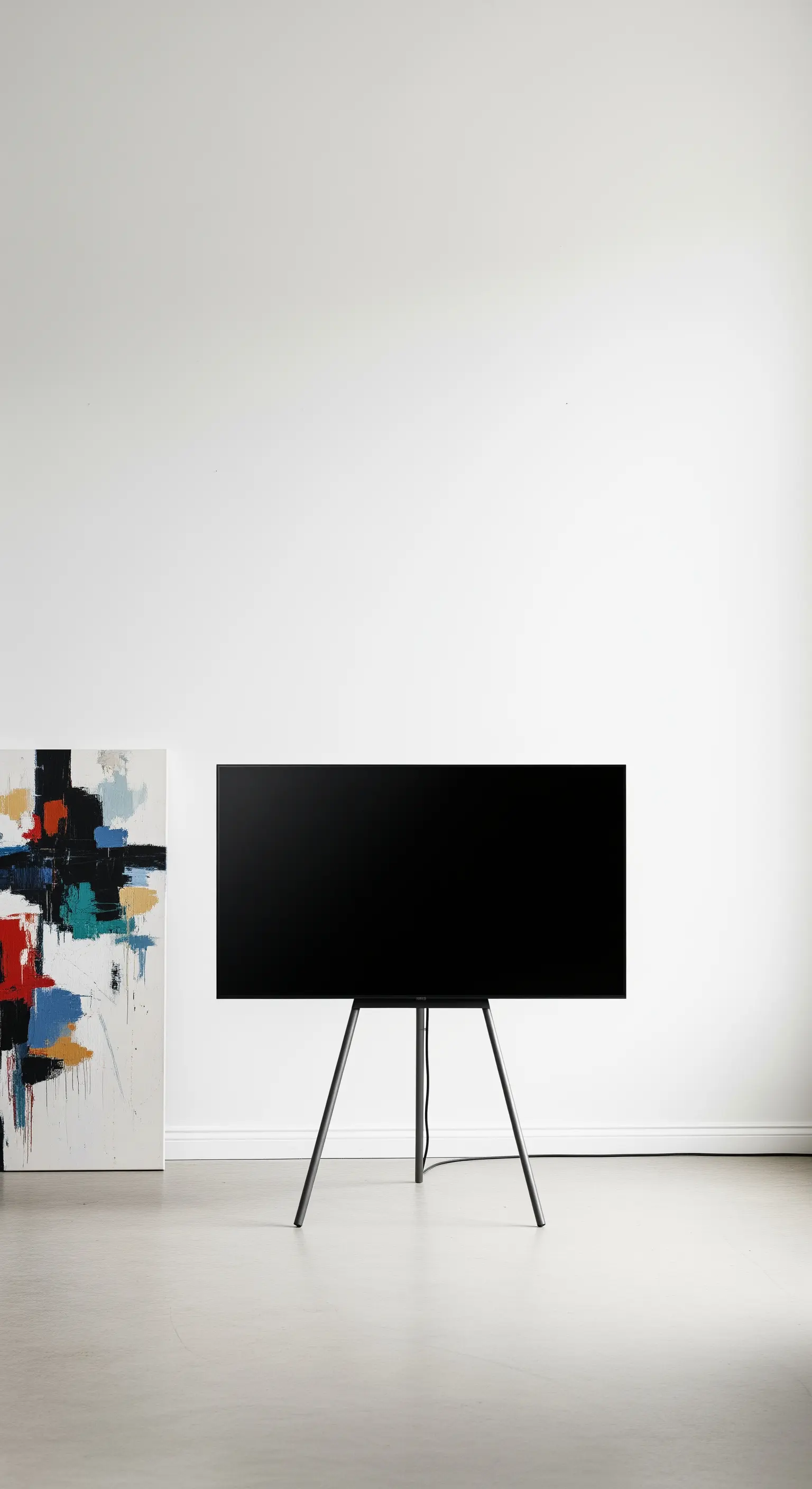 TV auf einem freistehenden Dreibein-Stativ