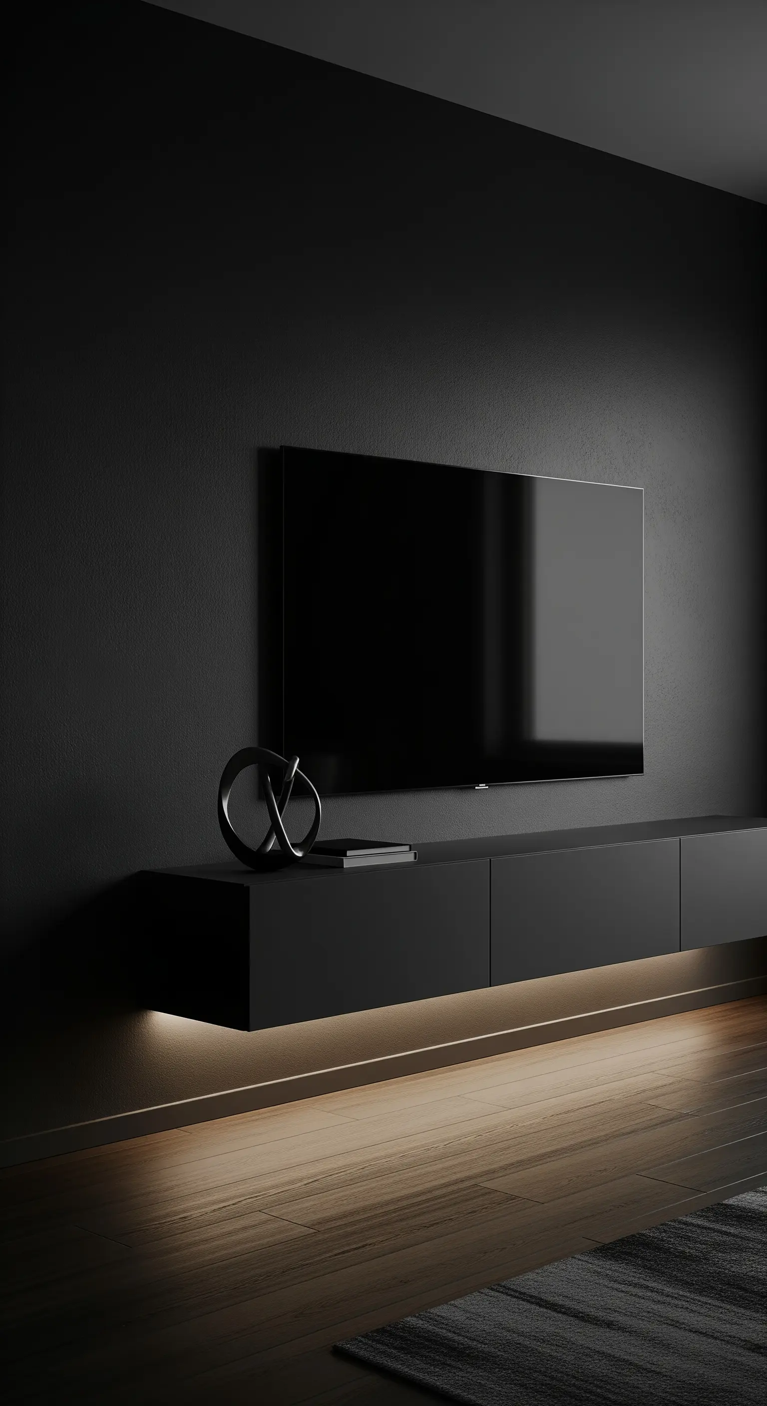 Schwarze Wand mit dunklem Lowboard und TV