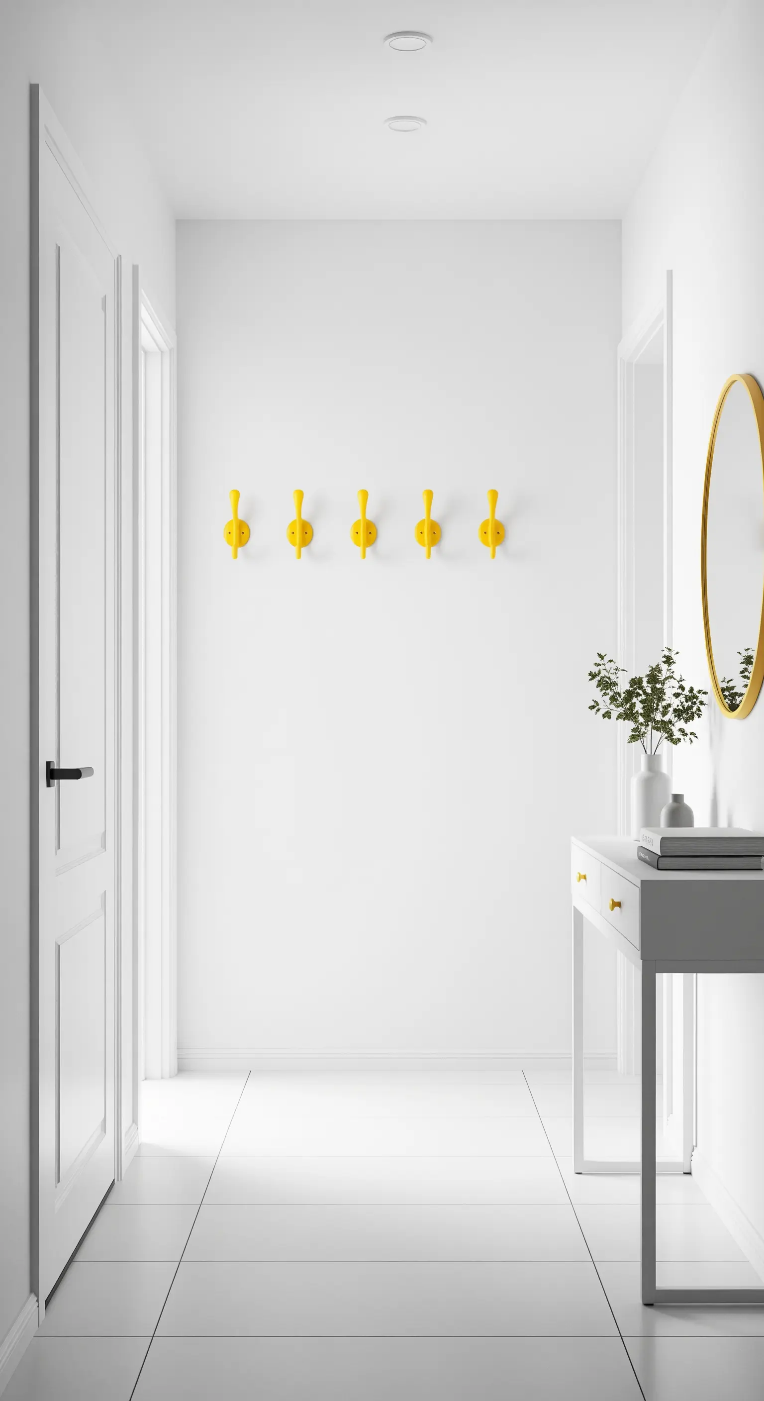 Minimalistischer weißer Flur mit leuchtend gelben Wandhaken als Farbakzent