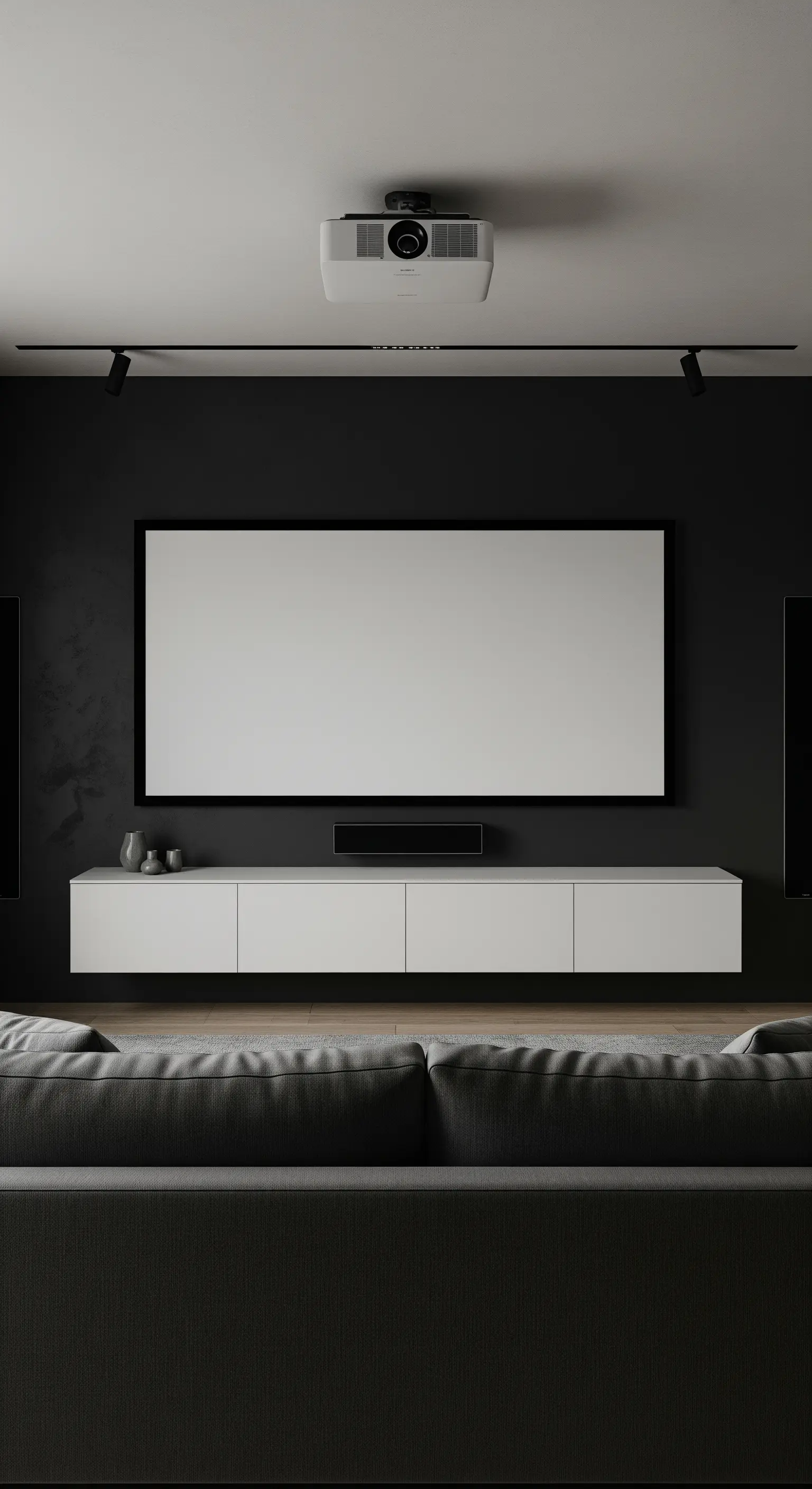Heimkino mit schwarzer Wand, Leinwand und schwebendem weißem Lowboard.
