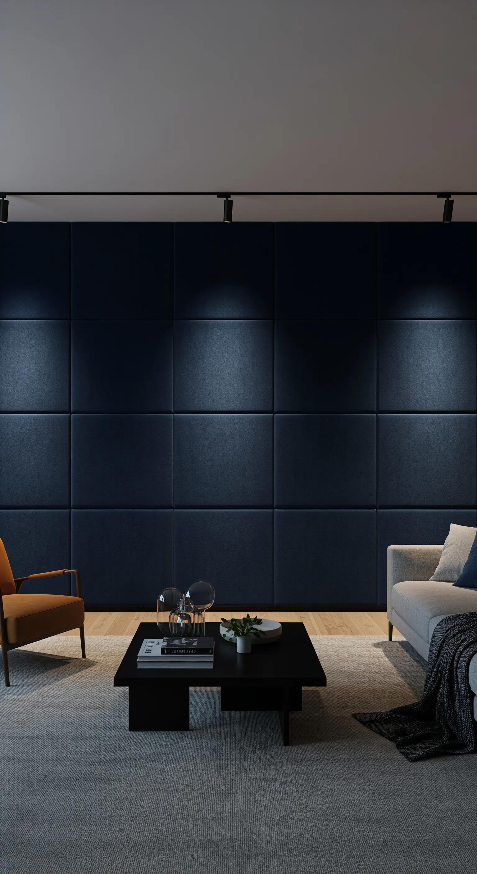 Minimalistisches Wohnzimmer mit dunkler Akustikwand, die von Deckenspots beleuchtet wird