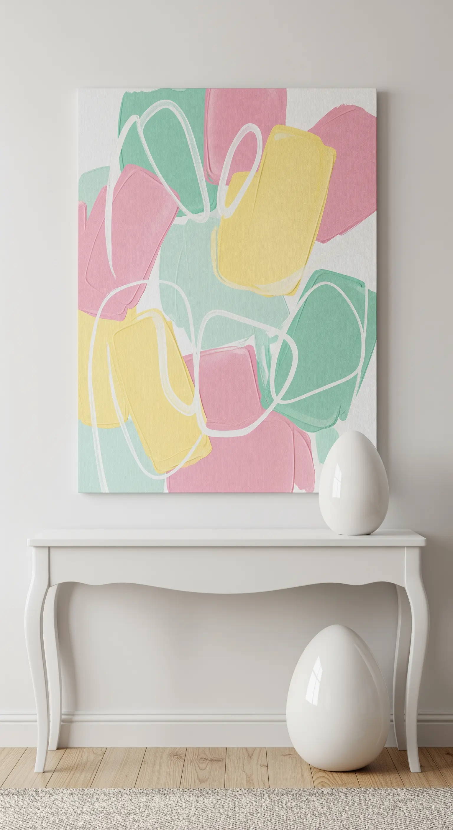 Moderne Osterdeko mit abstraktem Kunstwerk und großen, weißen Keramik-Eiern.